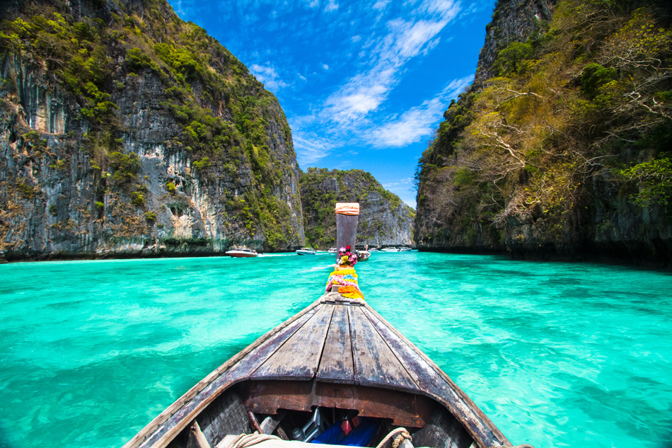 Traditional Wooden Boat In A Picture Perfect Tropical Bay