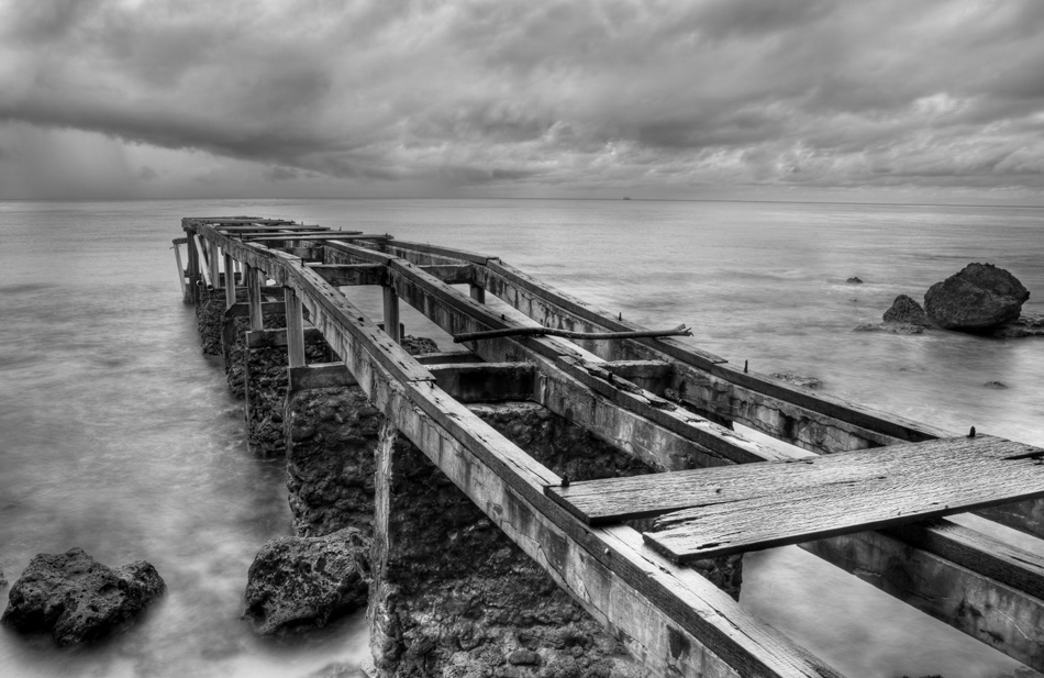 Abandoned old pier shot in black and white