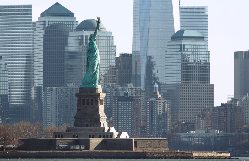 Manhattan Skyline And The Statue Of Liberty