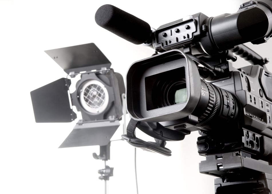 Digital Video Camera Recorder On Tripod And Lights