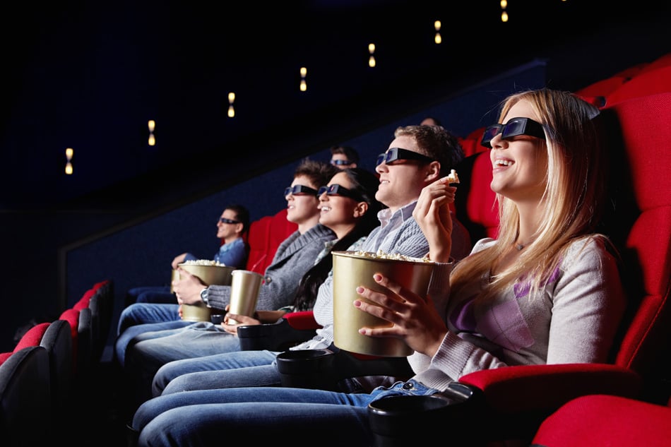 Smiling People In 3D Glasses In Cinema
