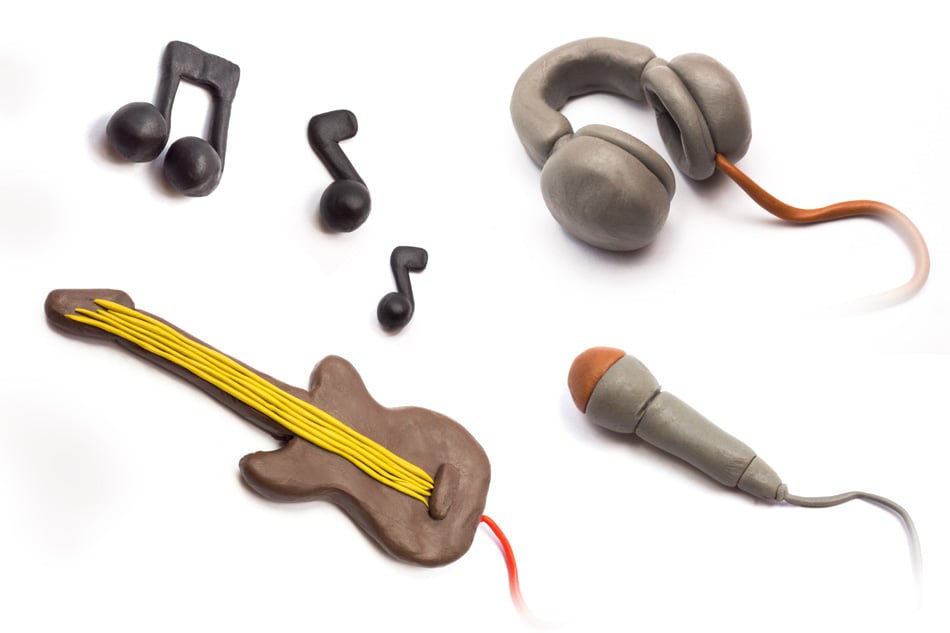 Musical instruments and notes molded from plasticine