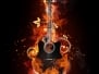 Acoustic - Electric Guitar In Fire Flame On Black