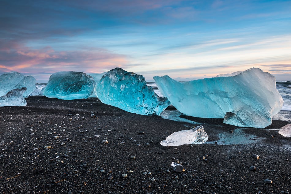 icebergs at crystal black beach in south Iceland