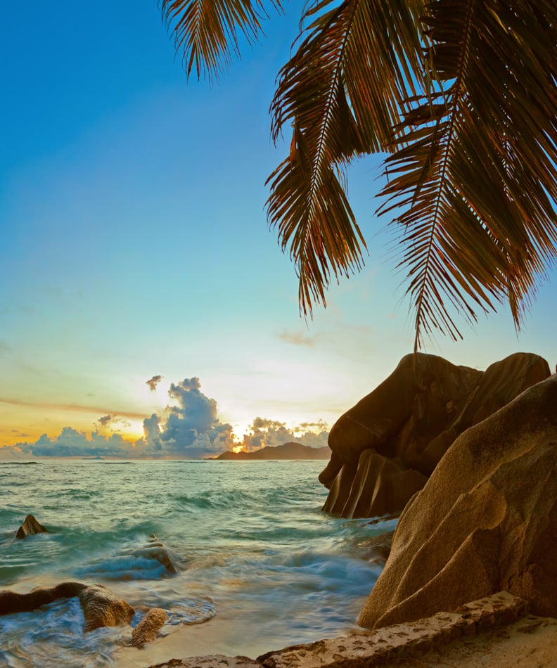 Sunset on tropical beach Source D'Argent at Seychelles