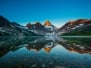 Reflection Of Mount Assiniboine On Magog Lake At Sunrise Alberta