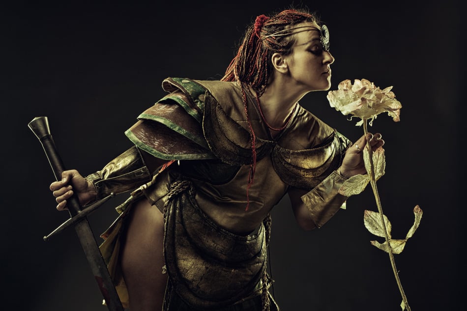 Barbarian Warrior With Sword Smelling A Rose