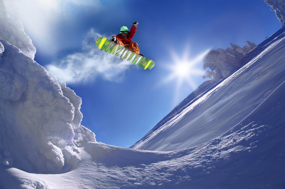 Snowboarder performing aerial jump