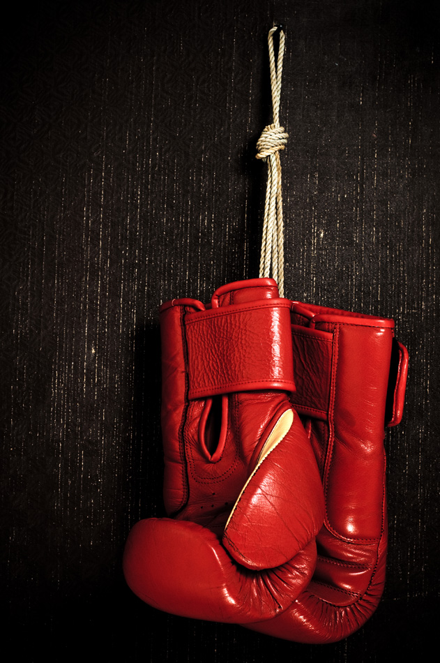 Boxing - Glove Hanging On Grunge Background