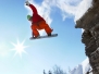 Snowboarder jumping against blue sky 2