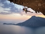Young female rock climber at sunset Kalymnos Island Greece