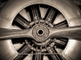 sepia toned vintage aircraft engine and propeller closeup