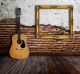 Guitar and picture frame in grunge room  - ID # 109033580
