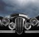 Vintage classic car front view with dark clouds - ID # 217901434