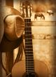 American country music background with cowboy hat and guitar - ID # 285076175