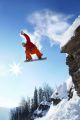 Snowboarder jumping against blue sky 2 - ID # 117128839
