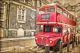 Red double decker bus vintage sepia texture London UK - ID # 203838535