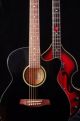Acoustic and bass guitars on black - ID # 243079027