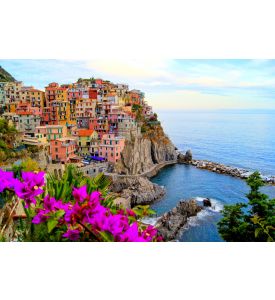 Village of Manarola on the Cinque Terre coast of Italy with flowers - ID # 100984339