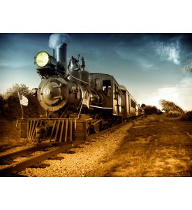 Vintage Steam engine locomotive train moving down railroad track towards 
camera - ID # 52846528